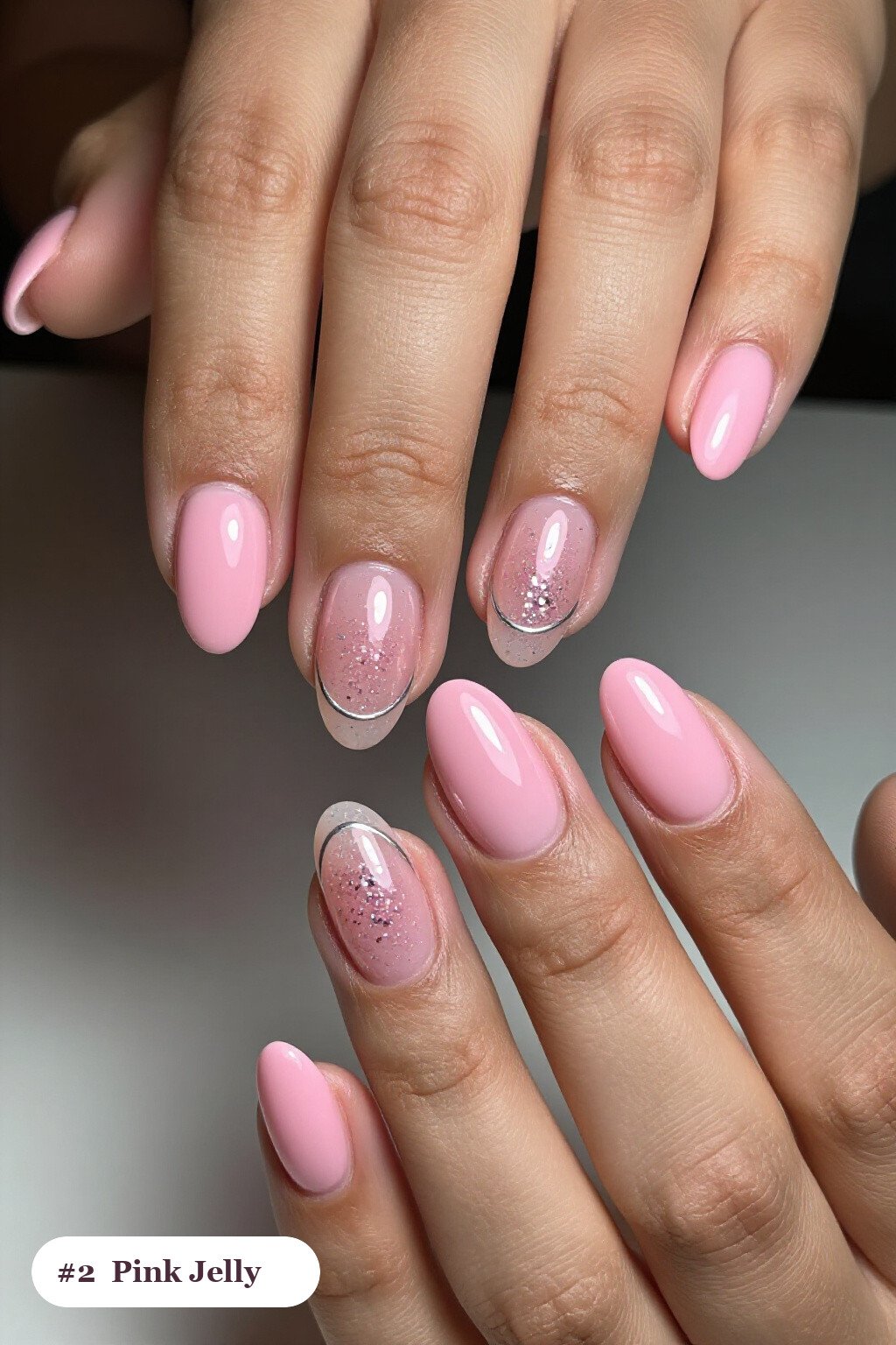 Medium Oval Pink Nails in Jelly Finish with Encapsulated Glitter and Silver Details - pink nails classy Medium Oval Pink Nails in Jelly Finish with Encapsulated Glitter and Silver Details - pink nails classy