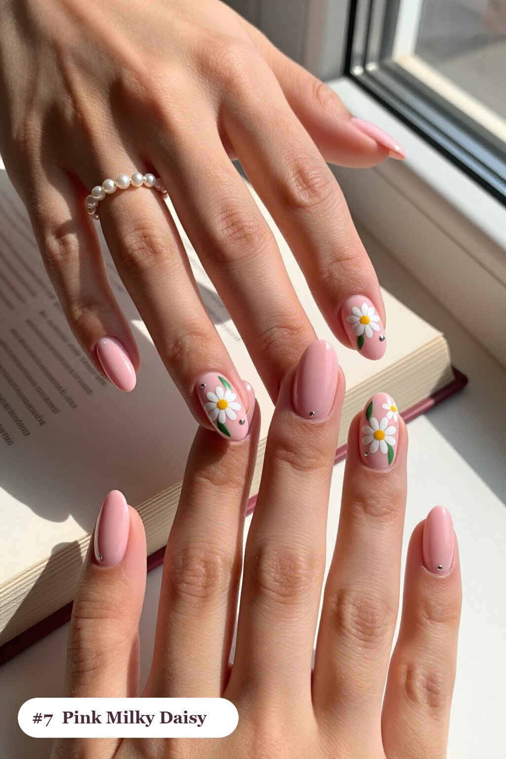 Medium Oval Pink Milky Nails Adorned with Daisies, Green Leaves and Silver Details - pink nails milky