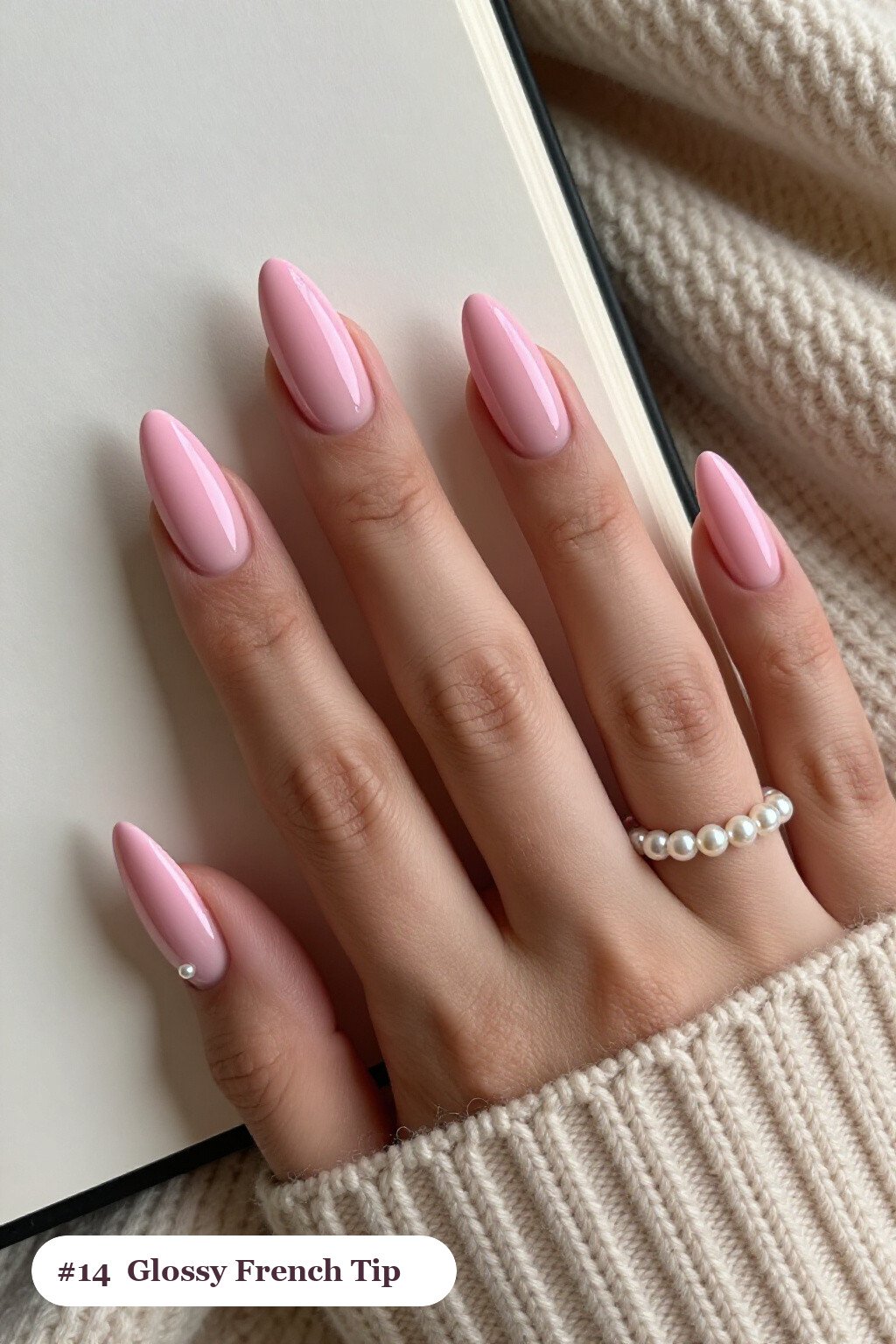Medium almond pink no french tip nails with crisp french tips clearly visible on every nail, styled with a flawless mirror-glossy full-colour finish, with pearl details - pink nails no french tip