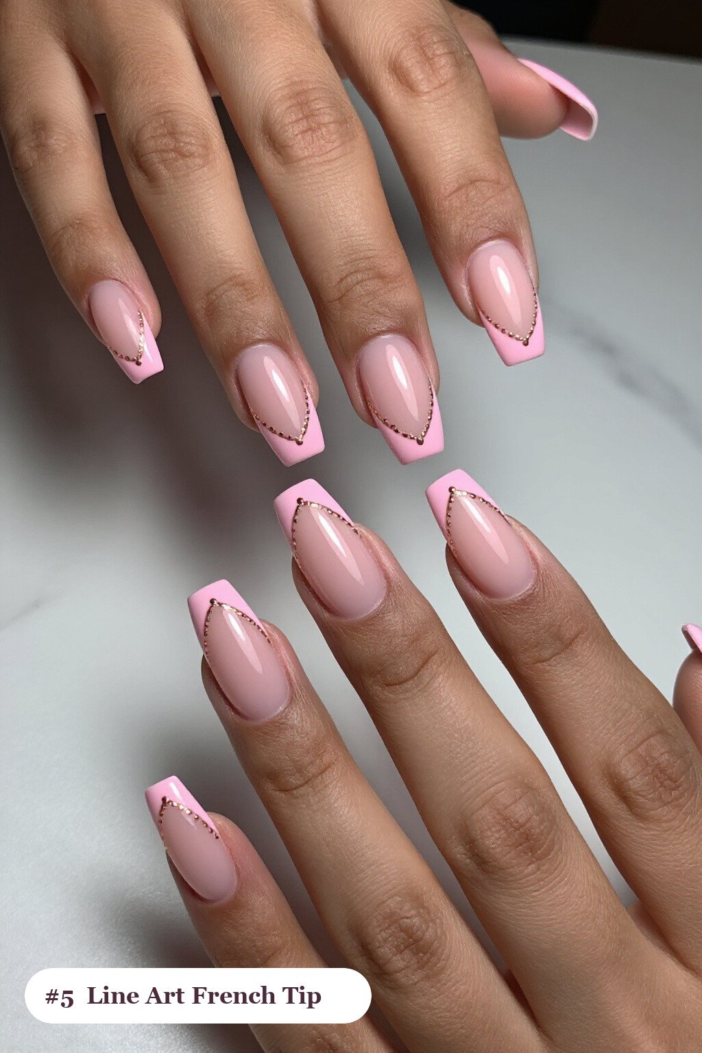 Long coffin pink no french tip nails with crisp french tips clearly visible on every nail, styled with fine gold line art and tiny dots drawn across every nail, with rose gold details - pink nails no french tip