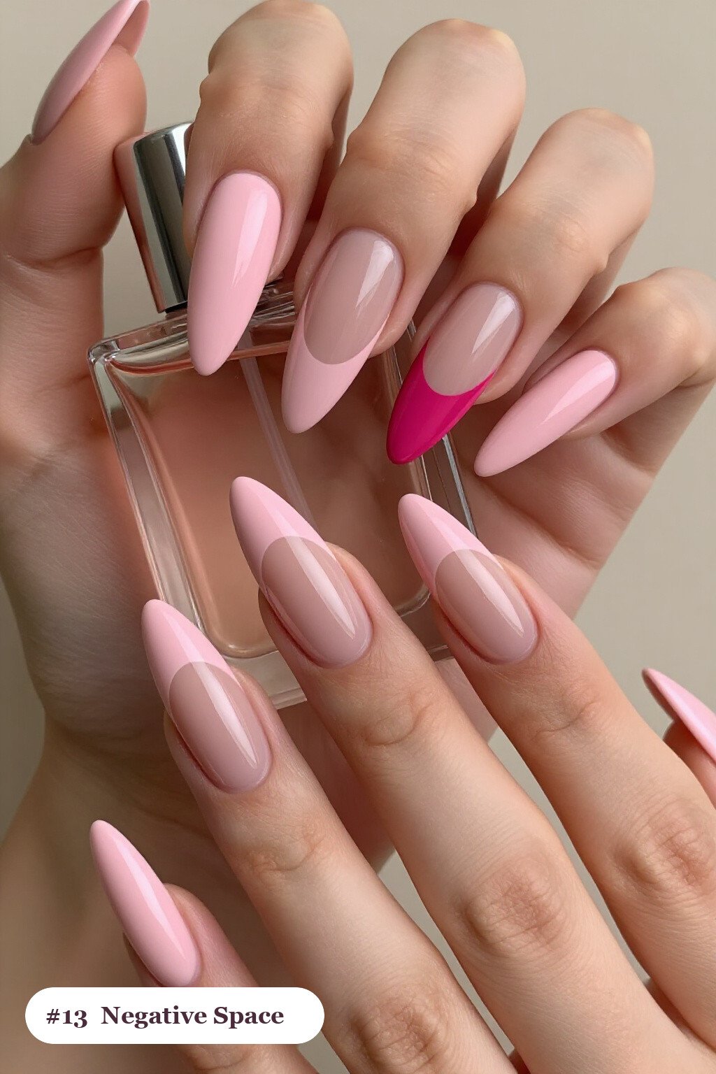 Long stiletto pink october nails in a negative-space design with sheer nude windows and bold colour shapes, with soft nude details - pink october nail designs Long stiletto pink october nails in a negative-space design with sheer nude windows and bold colour shapes, with soft nude details - pink october nail designs