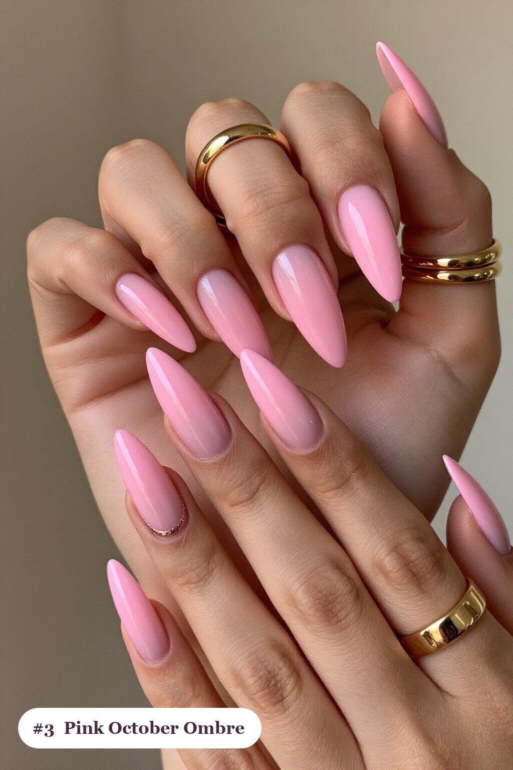 Long stiletto pink october nails with a vivid two-colour ombre melting from the cuticle to the tips, with rose gold details - pink october nail designs Long stiletto pink october nails with a vivid two-colour ombre melting from the cuticle to the tips, with rose gold details - pink october nail designs