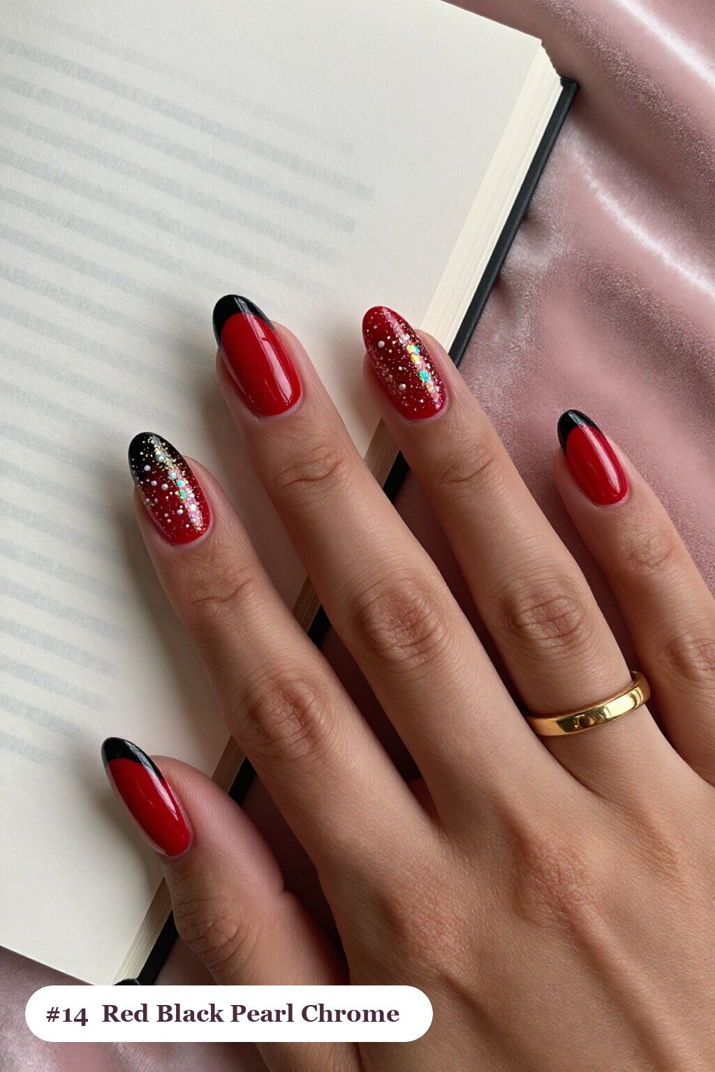 Medium oval red black nails with glazed pearl chrome over the colour for an iridescent sheen, with gold details - red and black nails