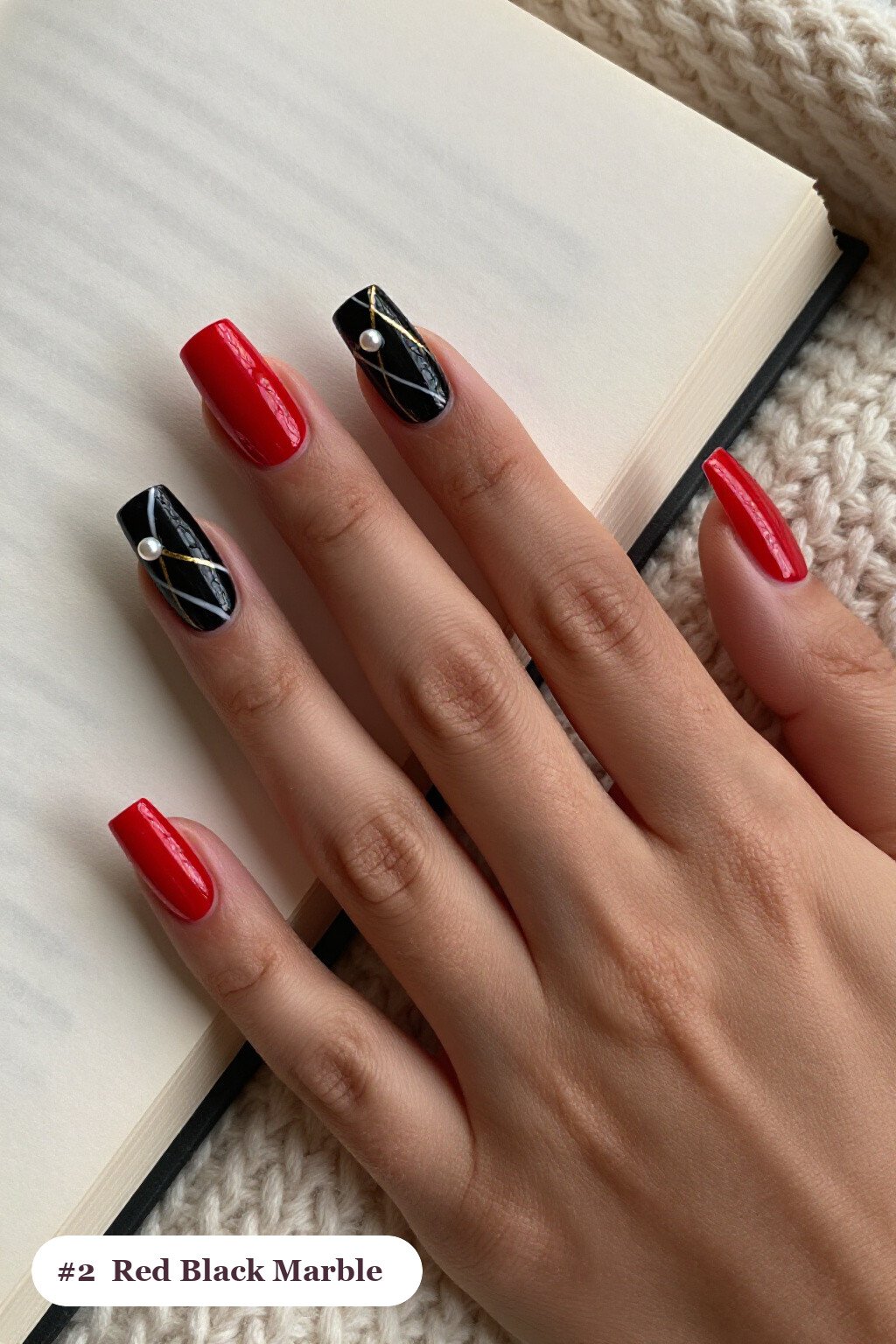 Short square red black nails with bold marble veins in white and gold across every nail, with pearl details - red and black nails