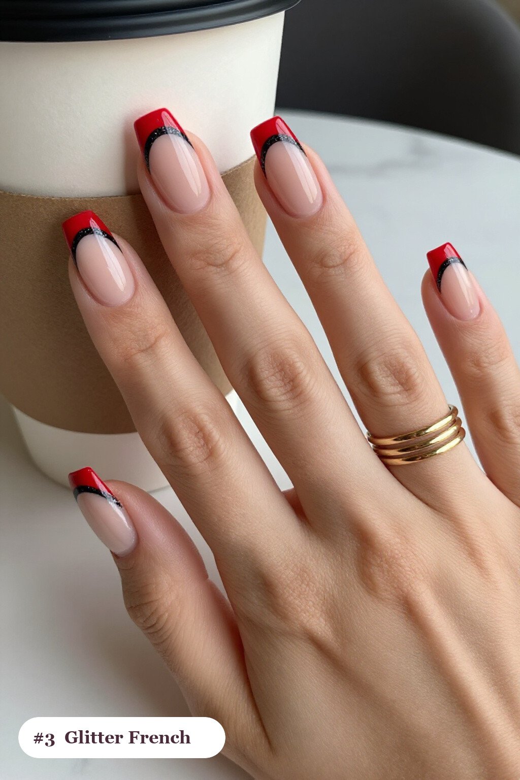 Medium square red black nails with glitter-packed french tips over a sheer nude base, with soft nude details - red and black nails