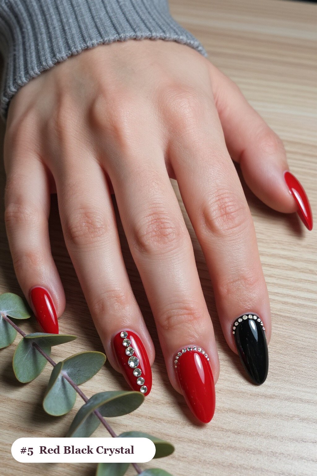 Long ballerina red black nails with rows of sparkling crystal rhinestones along the cuticle of every nail, with champagne details - red and black nails