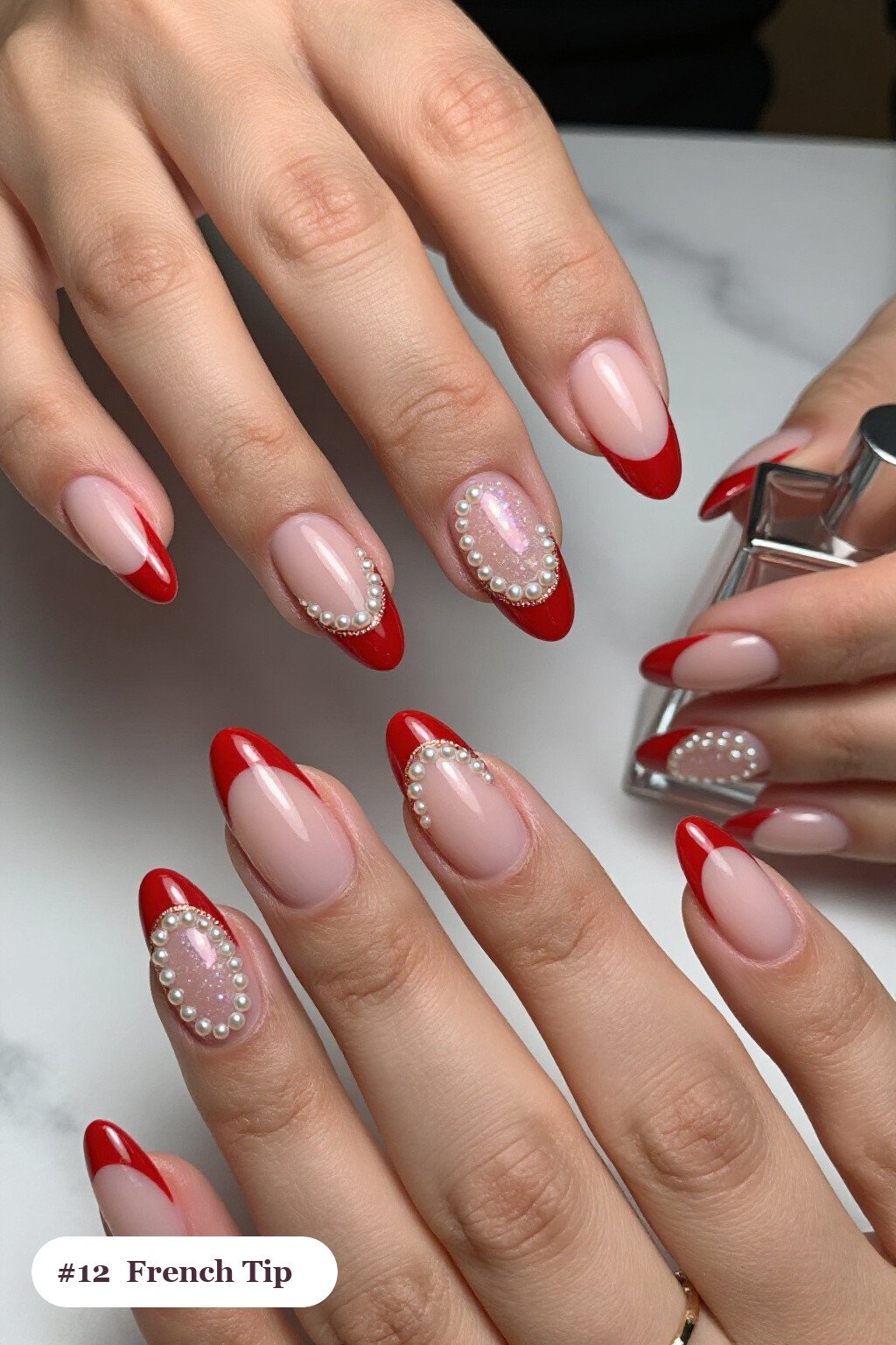 Long coffin red french nails with crisp french tips clearly visible on every nail, styled with glazed pearl chrome over the colour for an iridescent sheen, with rose gold details - red french nails Long coffin red french nails with crisp french tips clearly visible on every nail, styled with glazed pearl chrome over the colour for an iridescent sheen, with rose gold details - red french nails