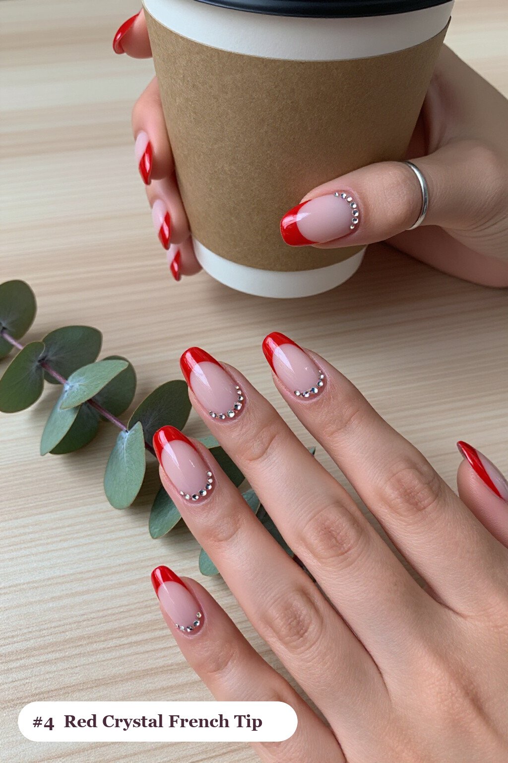 Medium square red french nails with crisp french tips clearly visible on every nail, styled with rows of sparkling crystal rhinestones along the cuticle of every nail, with rose gold details - red french nails Medium square red french nails with crisp french tips clearly visible on every nail, styled with rows of sparkling crystal rhinestones along the cuticle of every nail, with rose gold details - red french nails