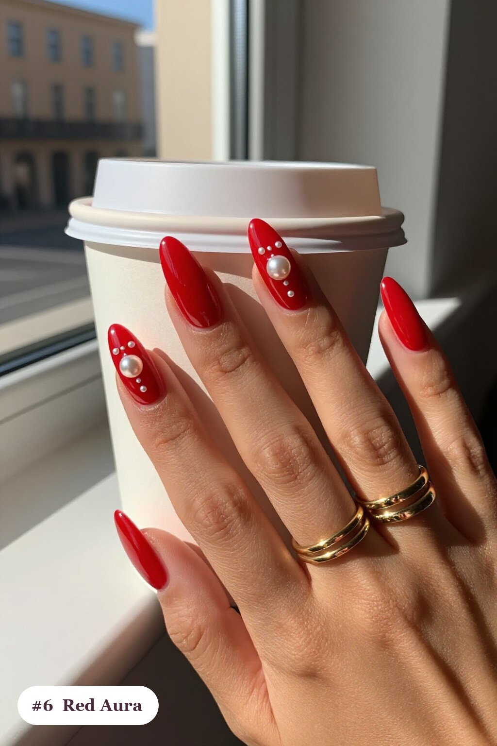 Medium coffin red nails with a glowing airbrushed aura in the centre of each nail, with pearl details - red nails