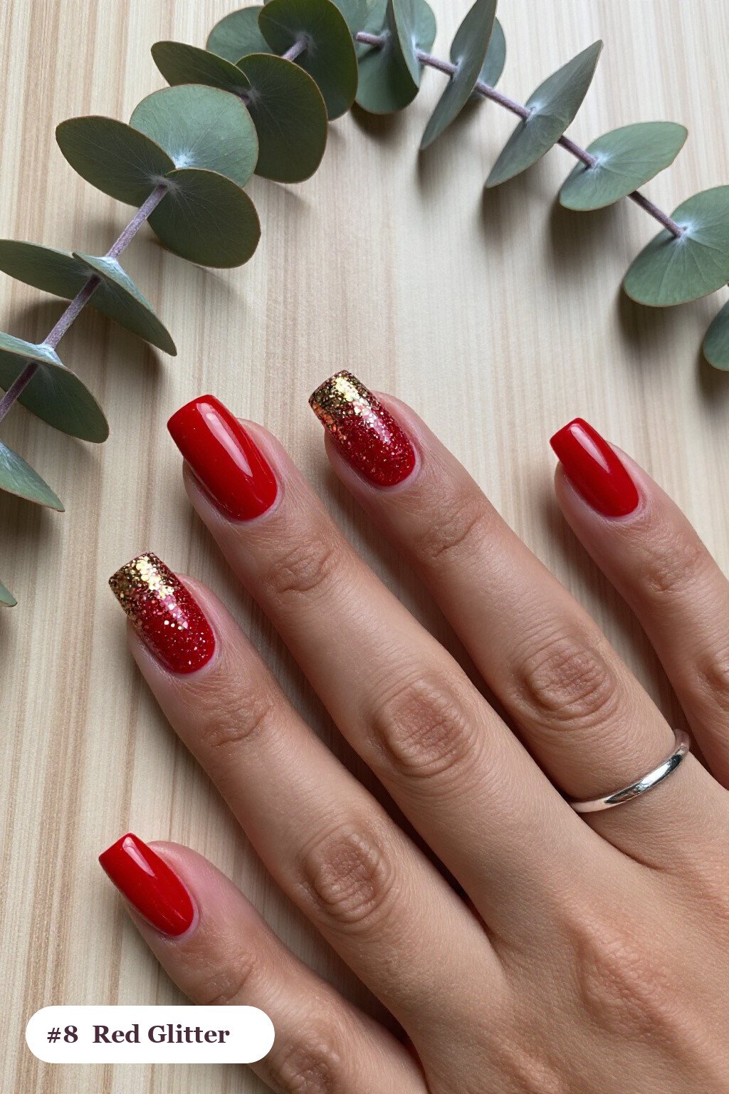 Short square red nails with a sparkling glitter gradient rising from the cuticle, with gold details - red nails