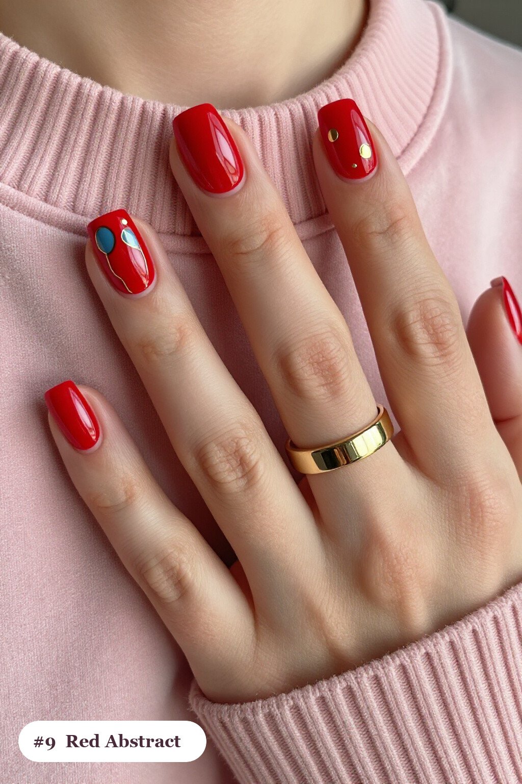 Medium square red nails with abstract art of colour blobs, gold outlines and dots, with gold details - red nails