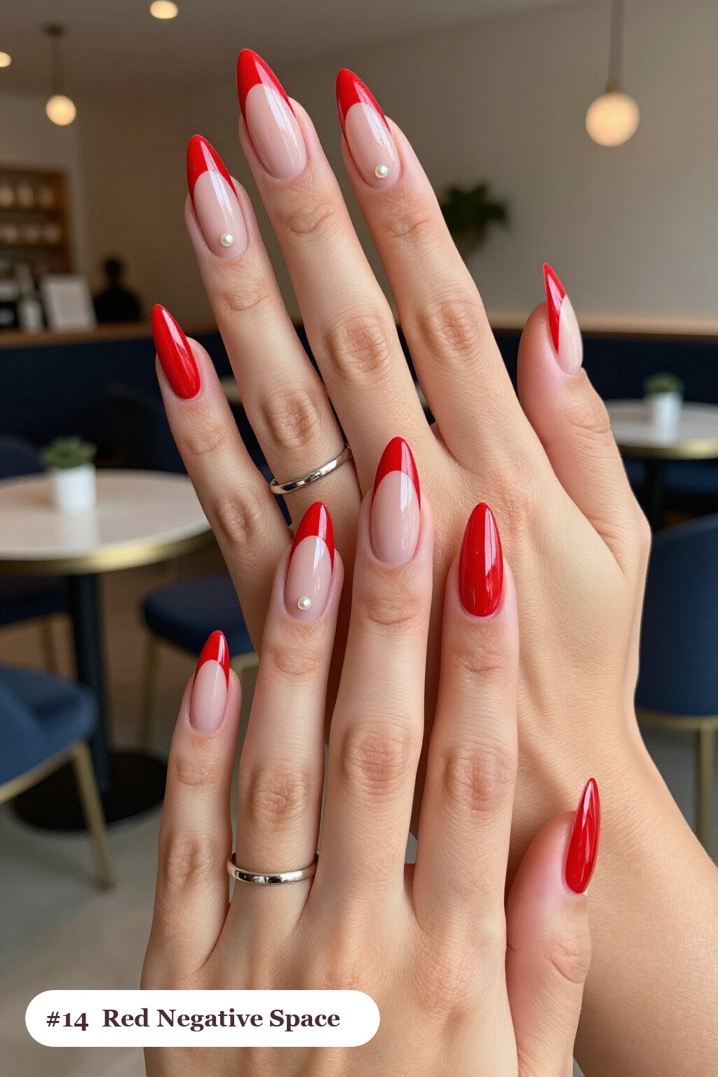 Stiletto Red Nails in Negative Space with Sheer Nude Windows and Bold Shapes - red nails design