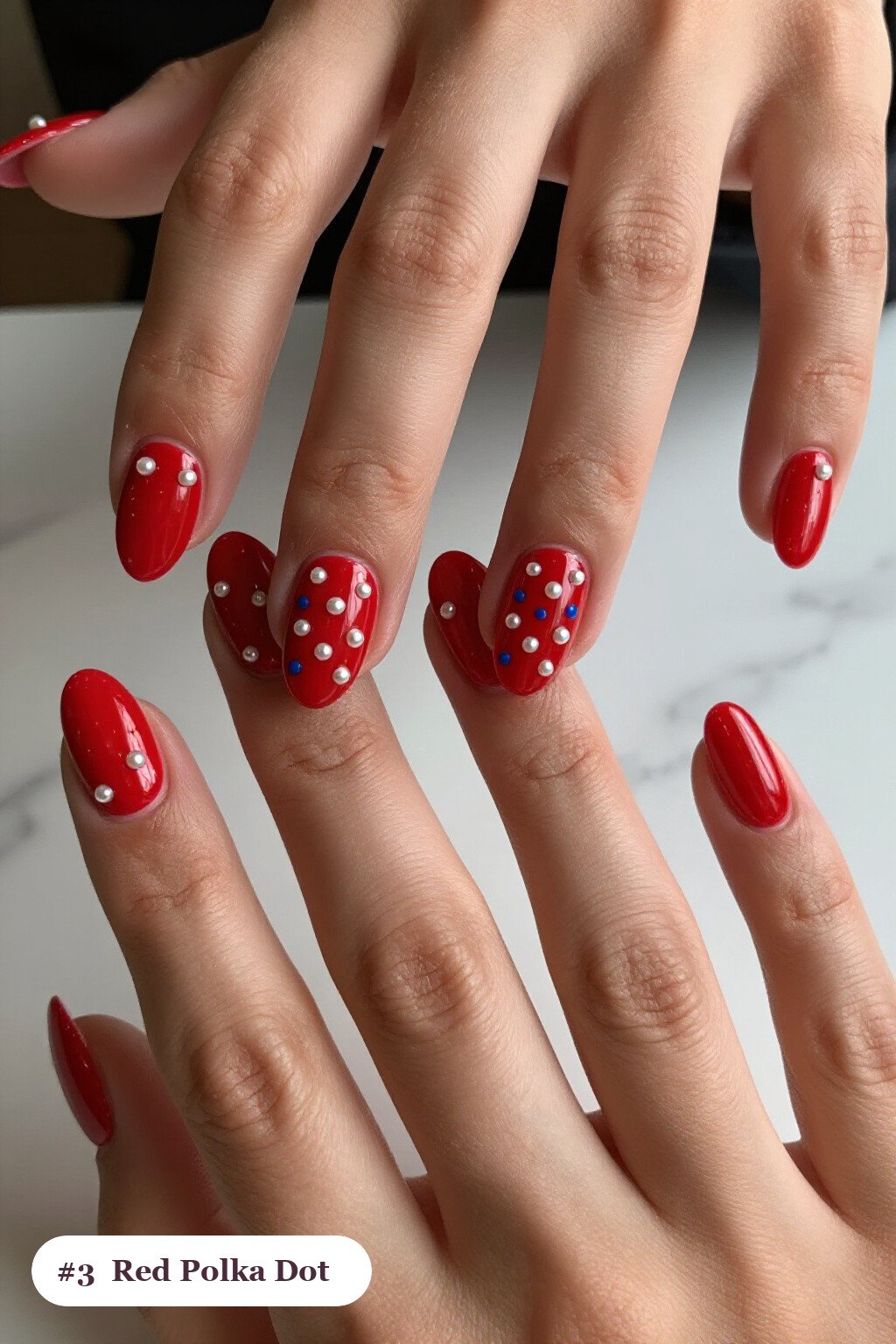 Oval Red Nails Featuring Dual‑Tone Polka Dots and Pearl Details - red nails holiday Oval Red Nails Featuring Dual‑Tone Polka Dots and Pearl Details - red nails holiday