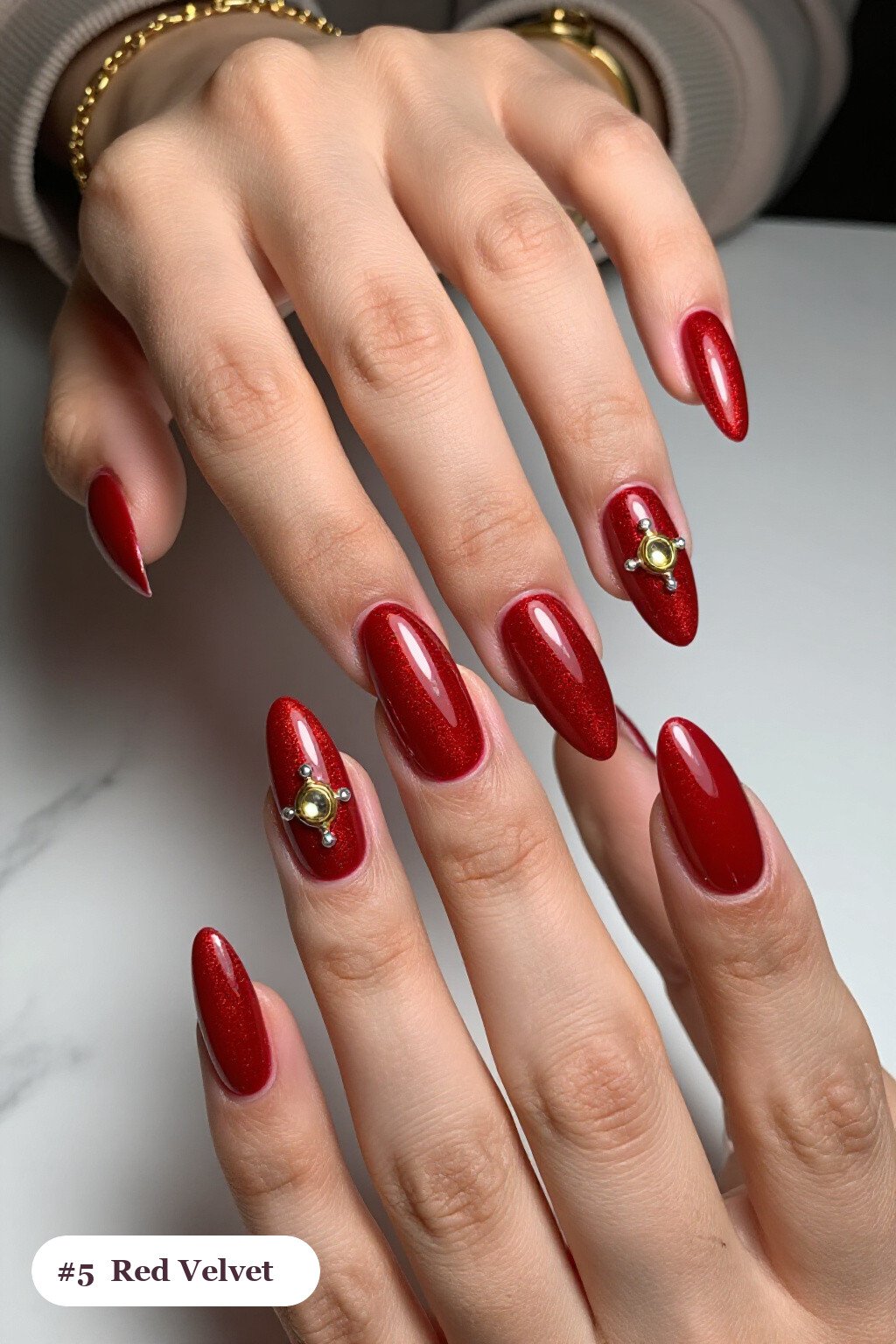 Velvet Shimmer Long Almond Red Nails Paired with Glossy Gold‑Charm Accent and Silver Details - red nails long Velvet Shimmer Long Almond Red Nails Paired with Glossy Gold‑Charm Accent and Silver Details - red nails long