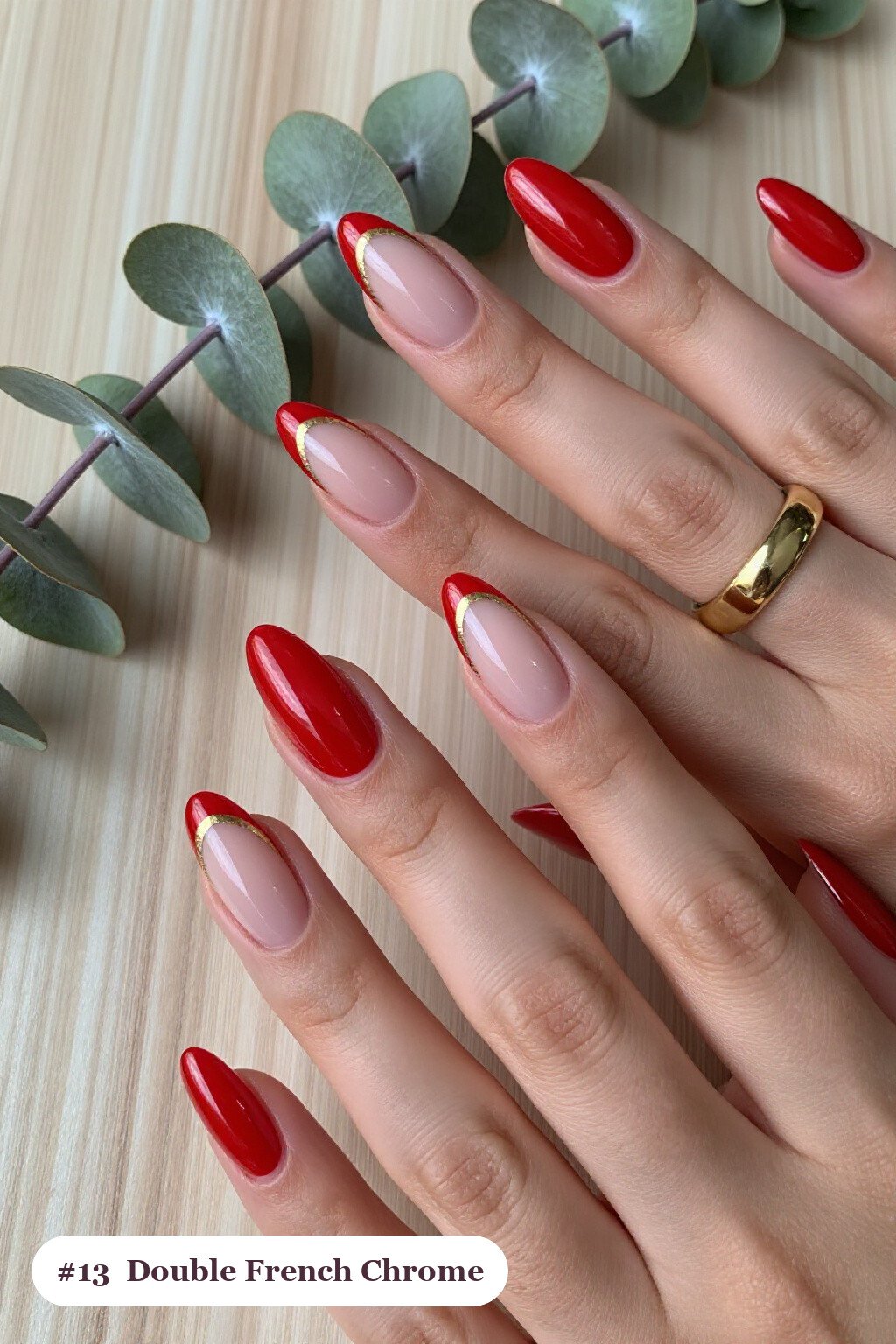Medium almond red chrome nails with a liquid chrome mirror finish clearly visible on every nail, styled with double-line french tips in two colours, with gold details - red nails with chrome Medium almond red chrome nails with a liquid chrome mirror finish clearly visible on every nail, styled with double-line french tips in two colours, with gold details - red nails with chrome
