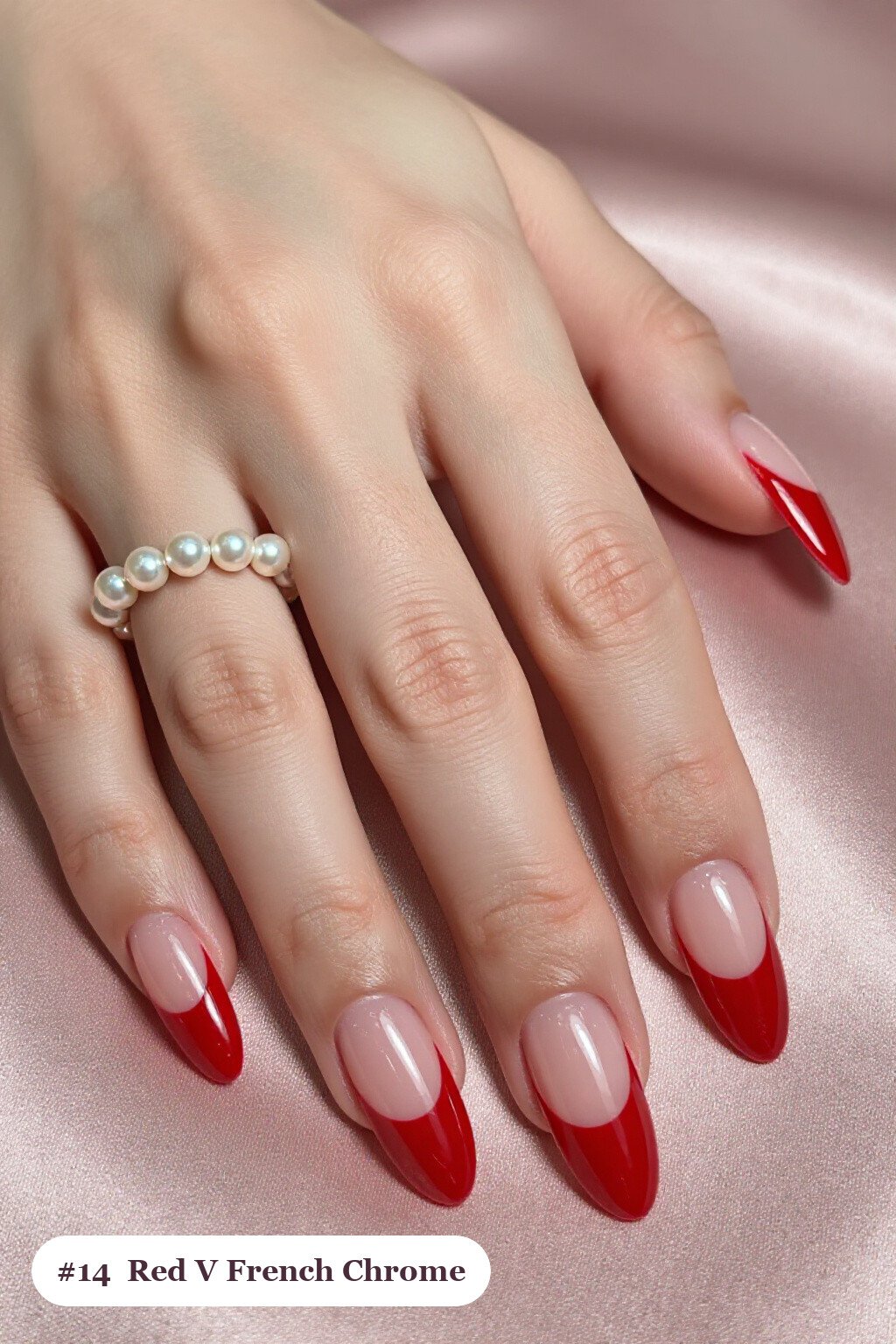 Long ballerina red chrome nails with a liquid chrome mirror finish clearly visible on every nail, styled with deep V-shaped french tips in a bold contrasting colour, with pearl details - red nails with chrome Long ballerina red chrome nails with a liquid chrome mirror finish clearly visible on every nail, styled with deep V-shaped french tips in a bold contrasting colour, with pearl details - red nails with chrome