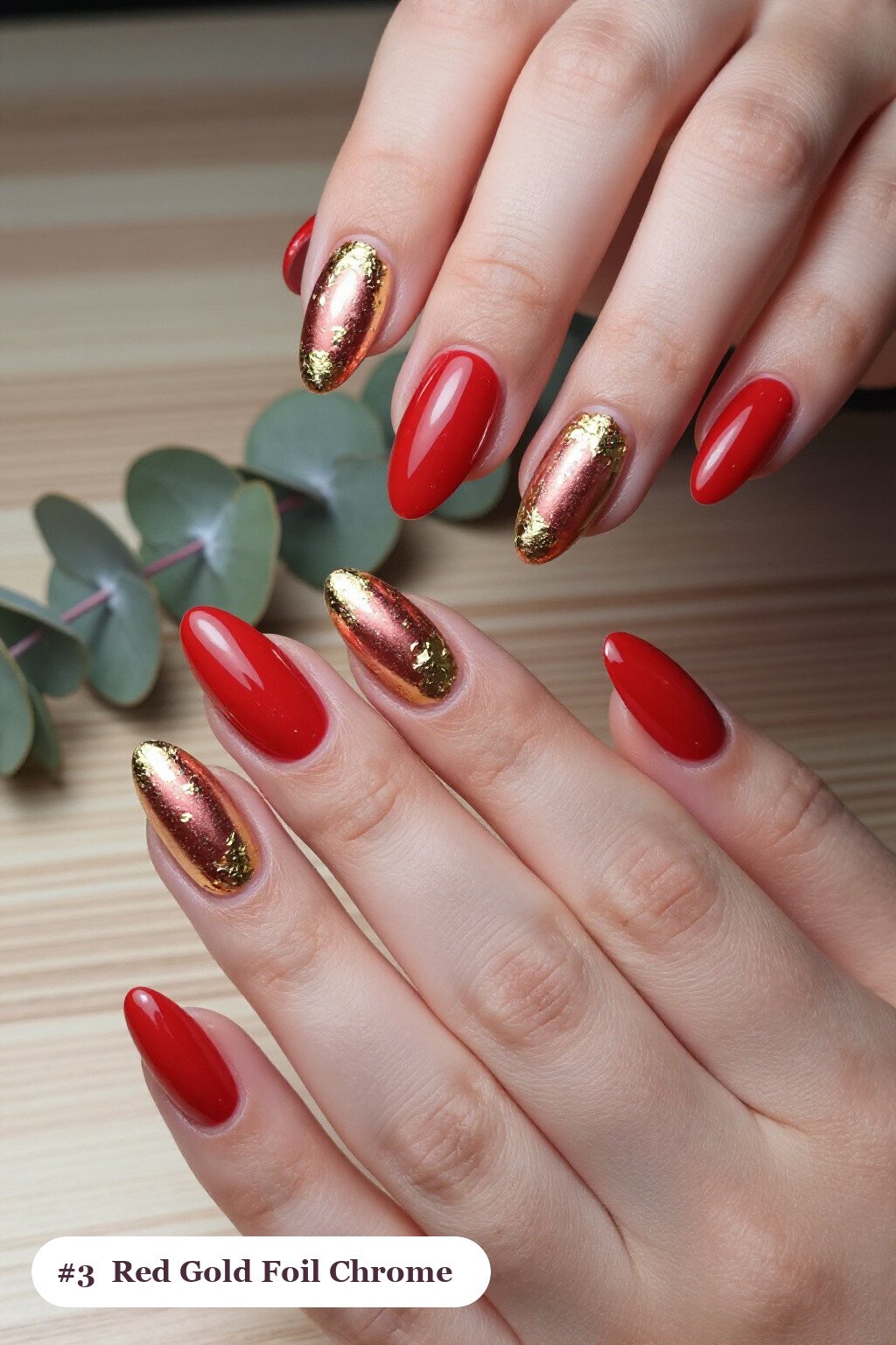 Medium almond red chrome nails with a liquid chrome mirror finish clearly visible on every nail, styled with dense gold foil flakes and gold leaf scattered across every nail, with rose gold details - red nails with chrome Medium almond red chrome nails with a liquid chrome mirror finish clearly visible on every nail, styled with dense gold foil flakes and gold leaf scattered across every nail, with rose gold details - red nails with chrome