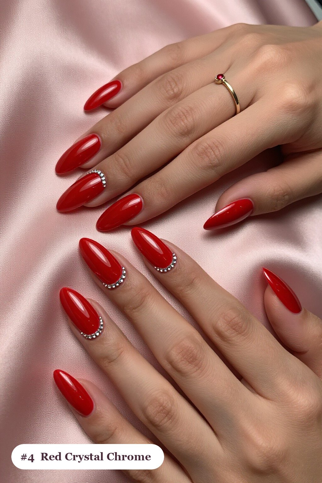 Long ballerina red chrome nails with a liquid chrome mirror finish clearly visible on every nail, styled with rows of sparkling crystal rhinestones along the cuticle of every nail - red nails with chrome Long ballerina red chrome nails with a liquid chrome mirror finish clearly visible on every nail, styled with rows of sparkling crystal rhinestones along the cuticle of every nail - red nails with chrome