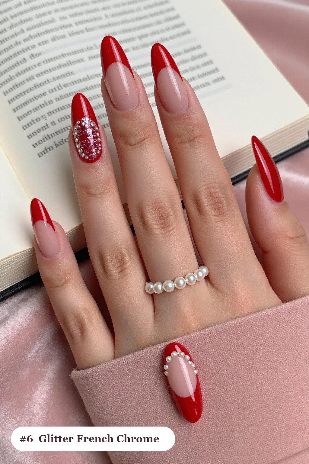 Long almond red chrome nails with a liquid chrome mirror finish clearly visible on every nail, styled with glitter-packed french tips over a sheer nude base, with pearl details - red nails with chrome Long almond red chrome nails with a liquid chrome mirror finish clearly visible on every nail, styled with glitter-packed french tips over a sheer nude base, with pearl details - red nails with chrome
