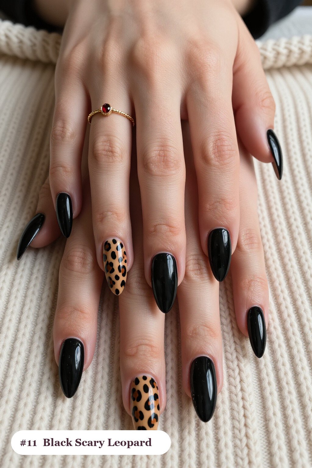 Black Almond Nails with Leopard Print Accents - scary halloween nail designs
