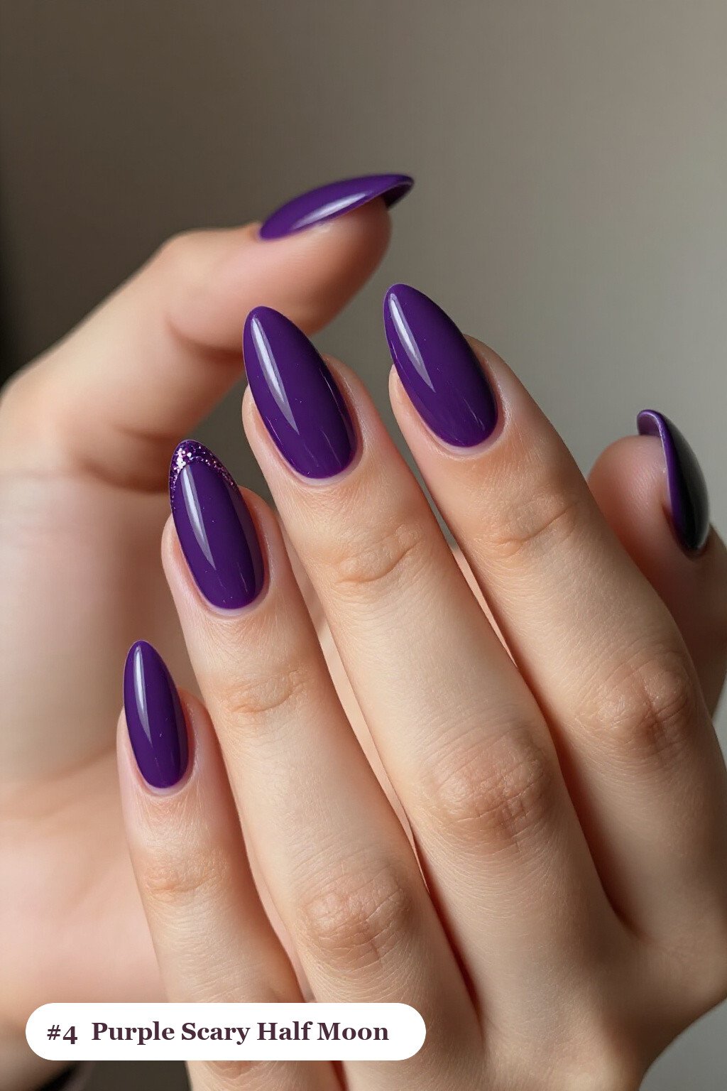 Deep Purple Half‑Moon Almond Nails with Glitter Crescent - scary halloween nail designs