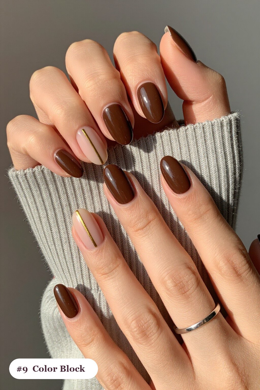 Chocolate Brown Short Almond Nails in Diagonal Color‑Block with Thin Gold Line - short almond nails designs