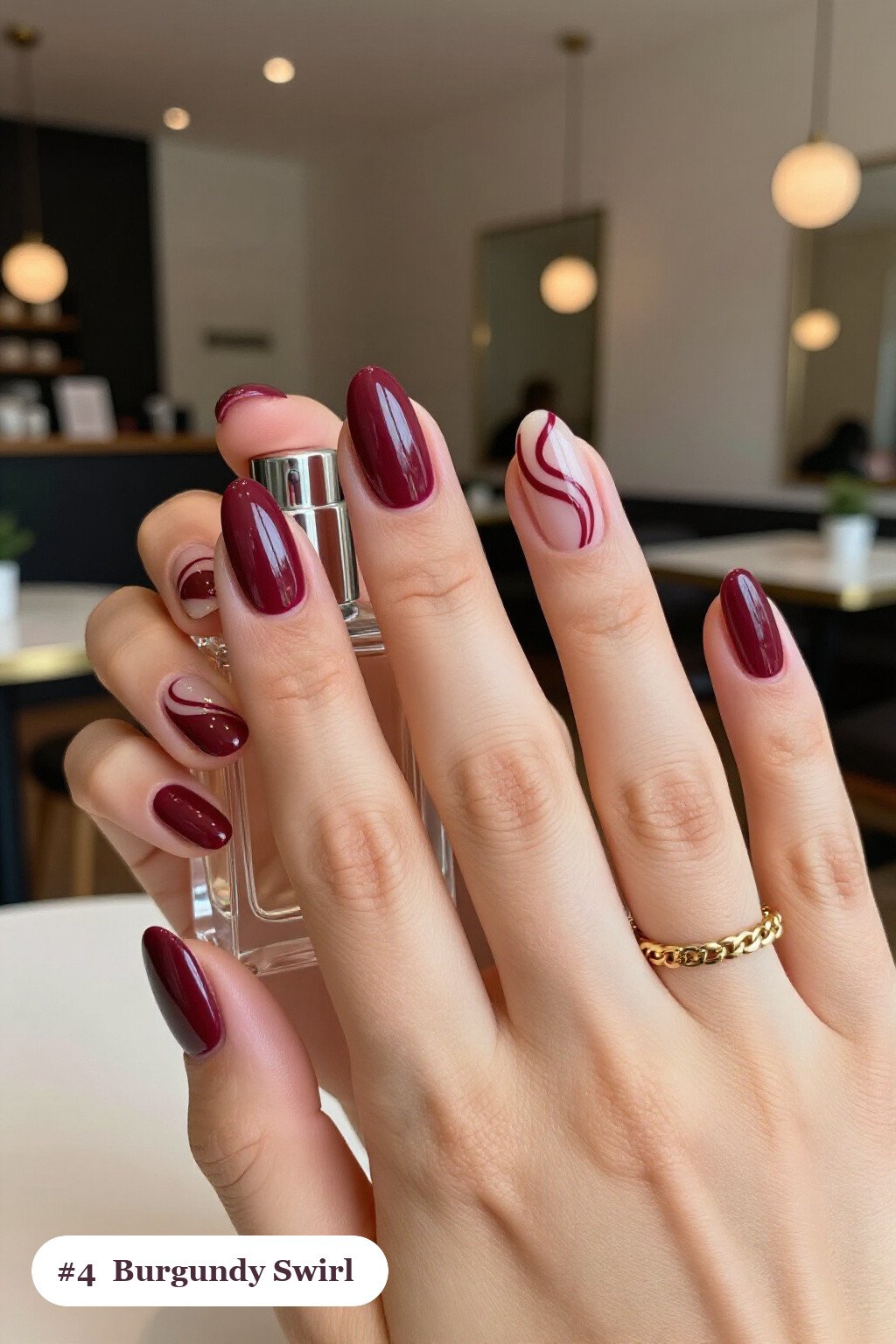 Burgundy Short Almond Nails Hand‑Painted with Bold Swirl Lines - short almond nails fall