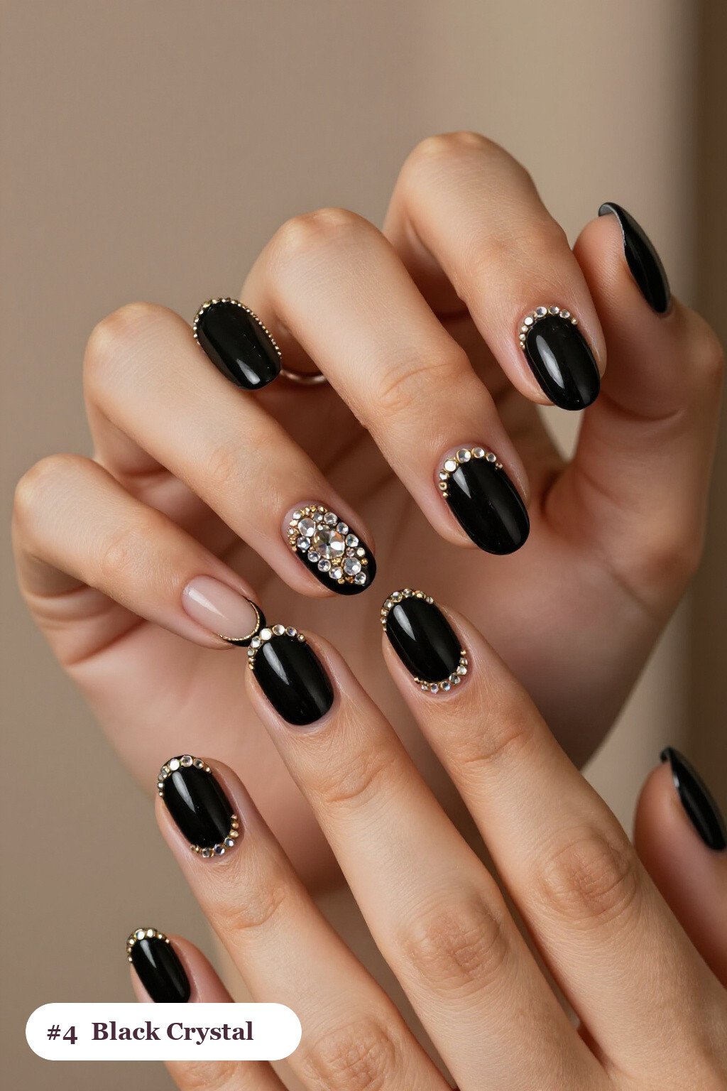 Short almond black nails with rows of sparkling crystal rhinestones along the cuticle of every nail, with gold details, perfect for halloween - short halloween nails black Short almond black nails with rows of sparkling crystal rhinestones along the cuticle of every nail, with gold details, perfect for halloween - short halloween nails black