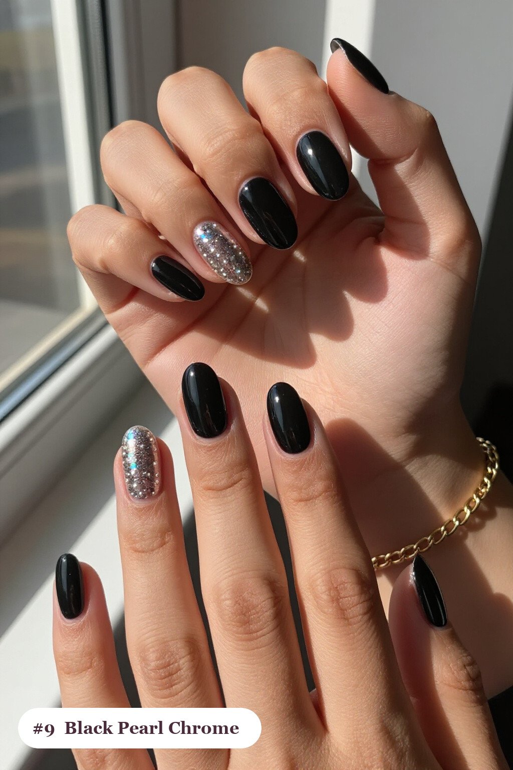Short almond black nails with glazed pearl chrome over the colour for an iridescent sheen, with silver details, perfect for halloween - short halloween nails black Short almond black nails with glazed pearl chrome over the colour for an iridescent sheen, with silver details, perfect for halloween - short halloween nails black