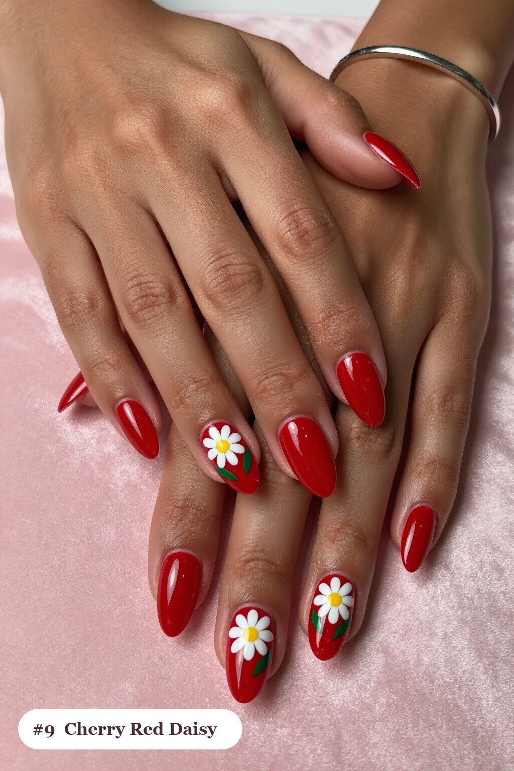 Cherry Red Almond Nails Hand‑Painted with Daisies and Green Leaves - simple almond nails