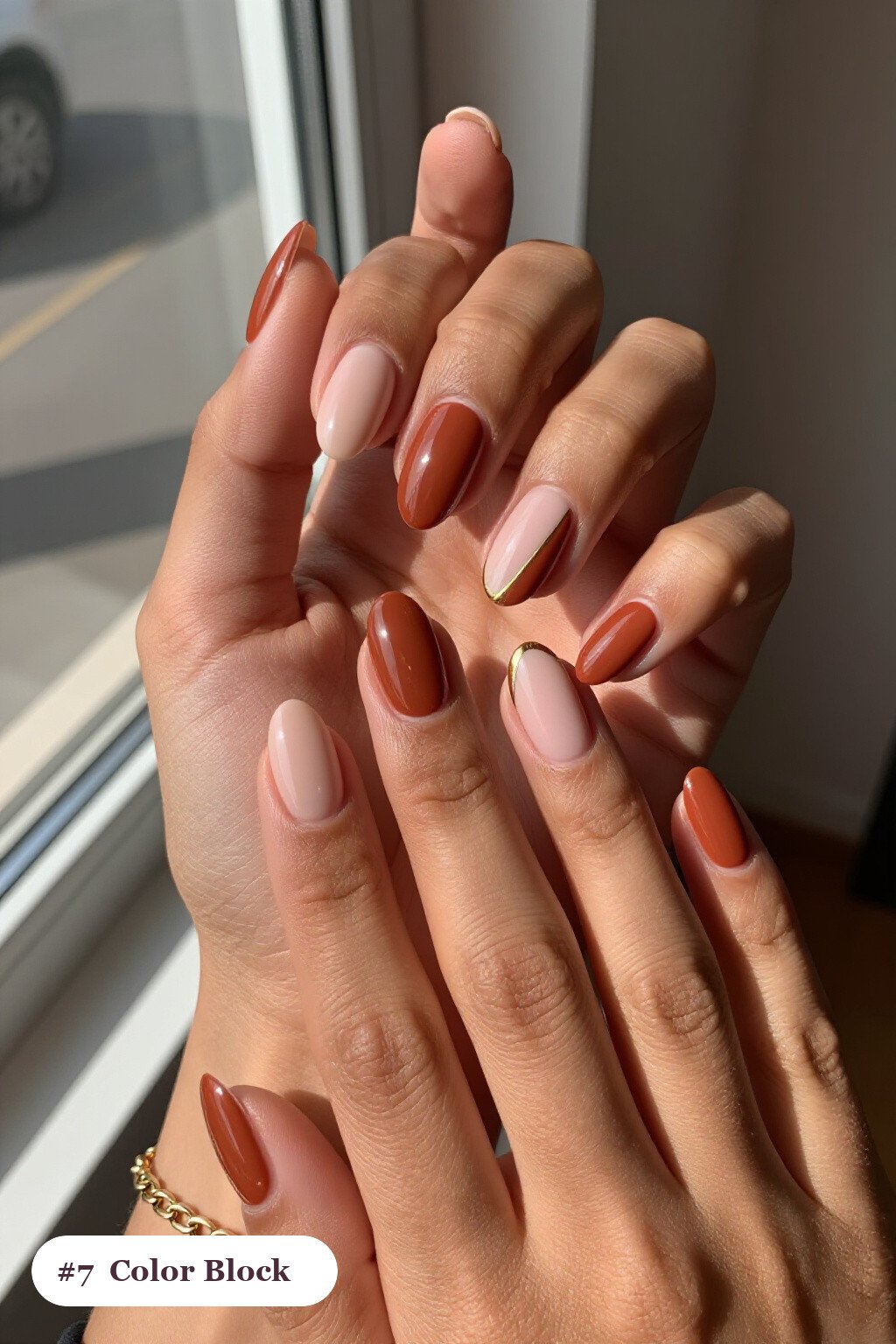 Terracotta Oval Nails with Diagonal Colour‑Block Split and Gold Line: Best Shades for Every Season - simple october nail designs