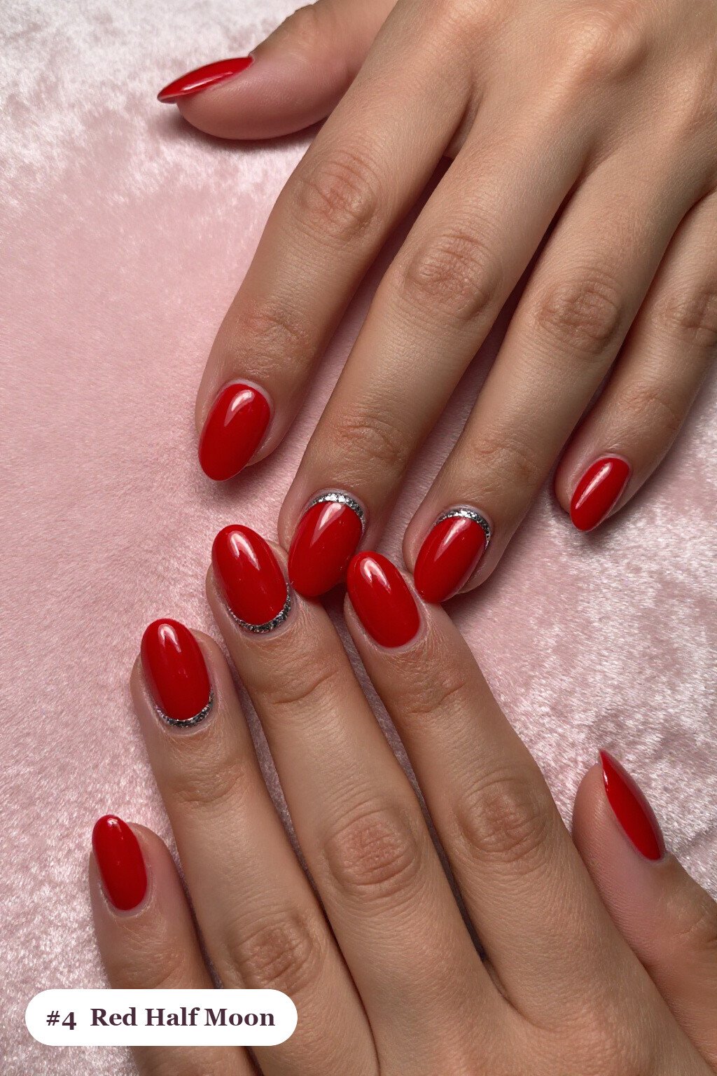 Oval Red Nails with Half‑Moon Glitter Crescent and Silver Chrome Accents - simple red nails