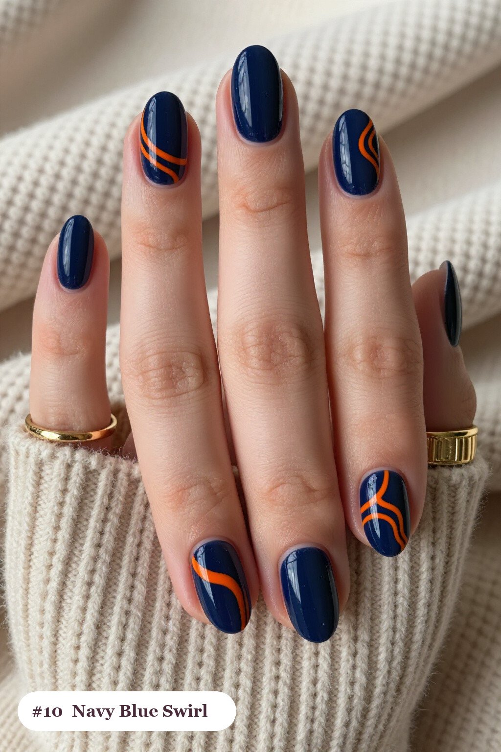 Navy Blue Oval Nails Hand‑Painted with Contrasting Swirl Lines - simple thanksgiving nail ideas