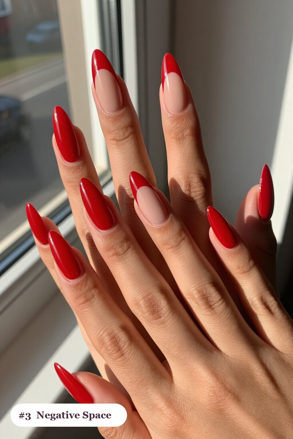Cherry Red Stiletto Negative‑Space Nails with Nude Windows and Bold Shapes - simple thanksgiving nail ideas
