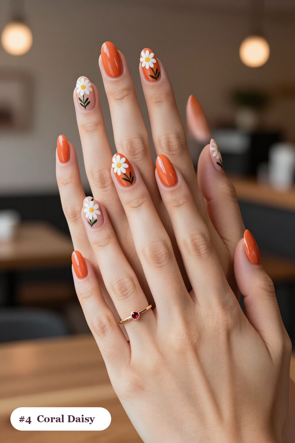 Coral Coffin Nails Hand‑Painted with Daisies and Green Leaves – Simple Thanksgiving Nail Ideas - simple thanksgiving nail ideas