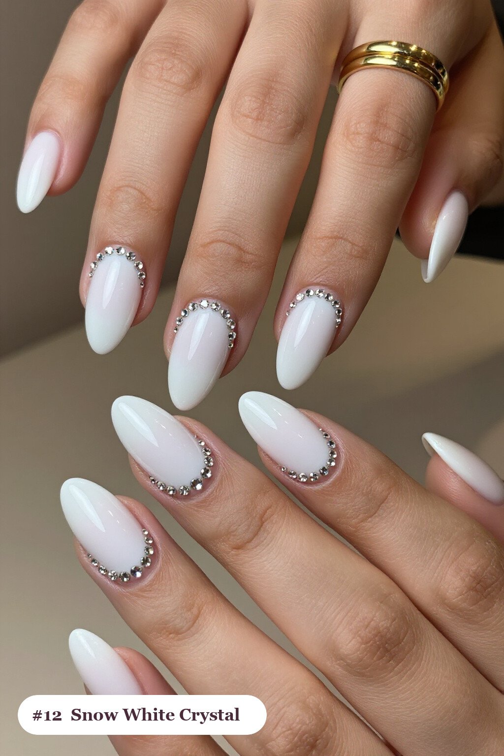 Snow White Almond Nails with Crystal Rhinestone Rows - simple winter nails Snow White Almond Nails with Crystal Rhinestone Rows - simple winter nails
