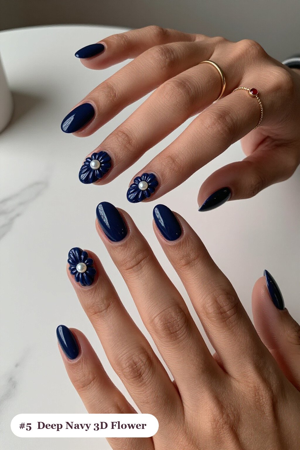 Oval Deep Navy 3D Flowers with Pearl Centers on Accent Nails - simple winter nails Oval Deep Navy 3D Flowers with Pearl Centers on Accent Nails - simple winter nails