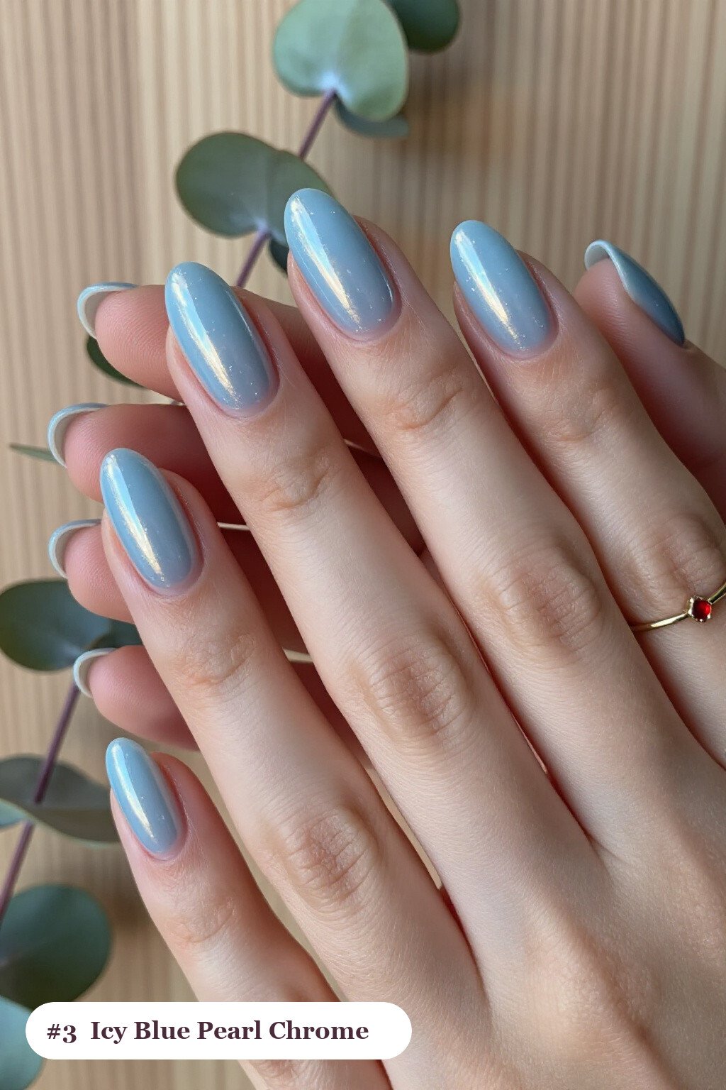 Icy Blue Almond Nails Covered in Glazed Pearl Chrome for Frosty Sheen - simple winter short nails Icy Blue Almond Nails Covered in Glazed Pearl Chrome for Frosty Sheen - simple winter short nails