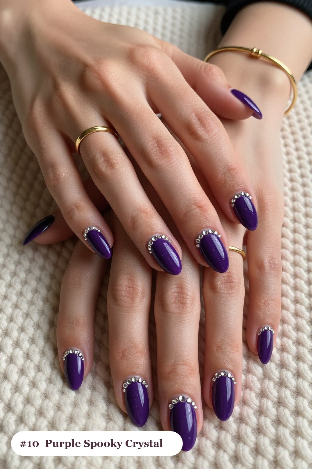 Deep‑Purple Medium Ovals Encrusted with Sparkling Crystal Rhinestones Along the Cuticle - spooky halloween nails