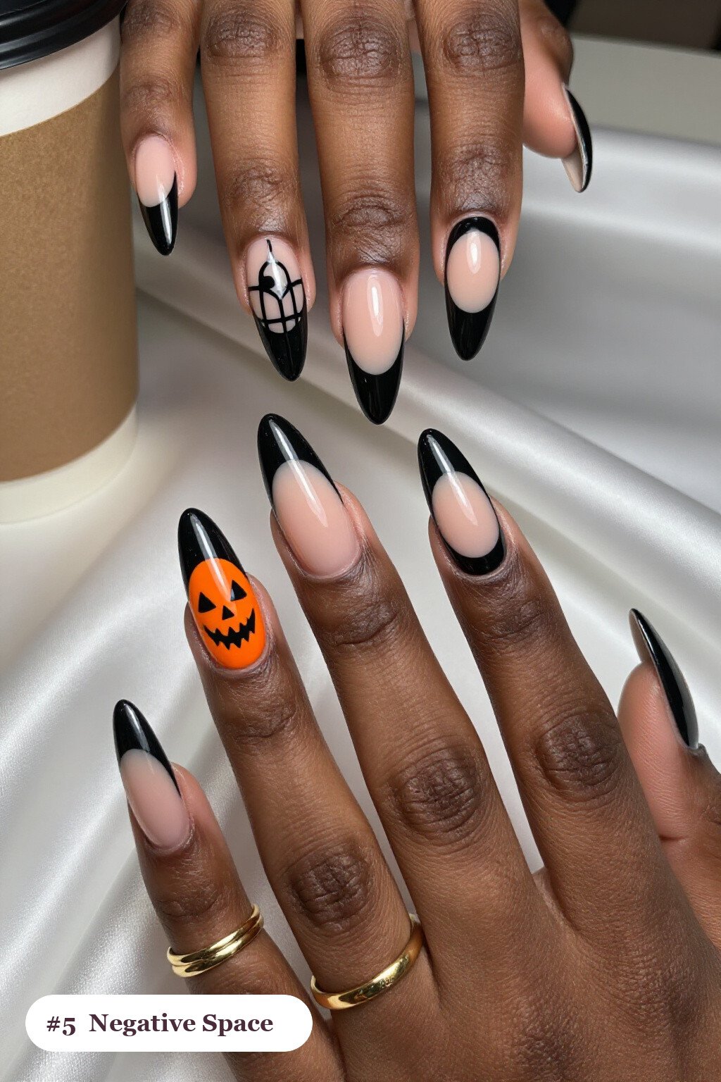 Long Ballerina Black Nails with Negative‑Space Nude Windows and Bold Colour Shapes: How to Make It Last Longer - spooky halloween nails