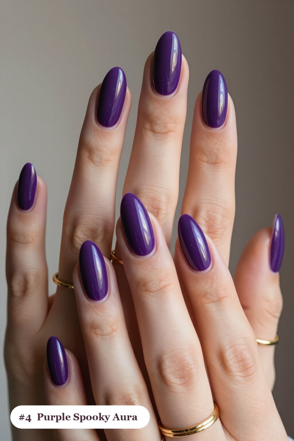 Medium almond deep purple spooky nails with a glowing airbrushed aura in the centre of each nail, perfect for halloween - spooky halloween nails almond