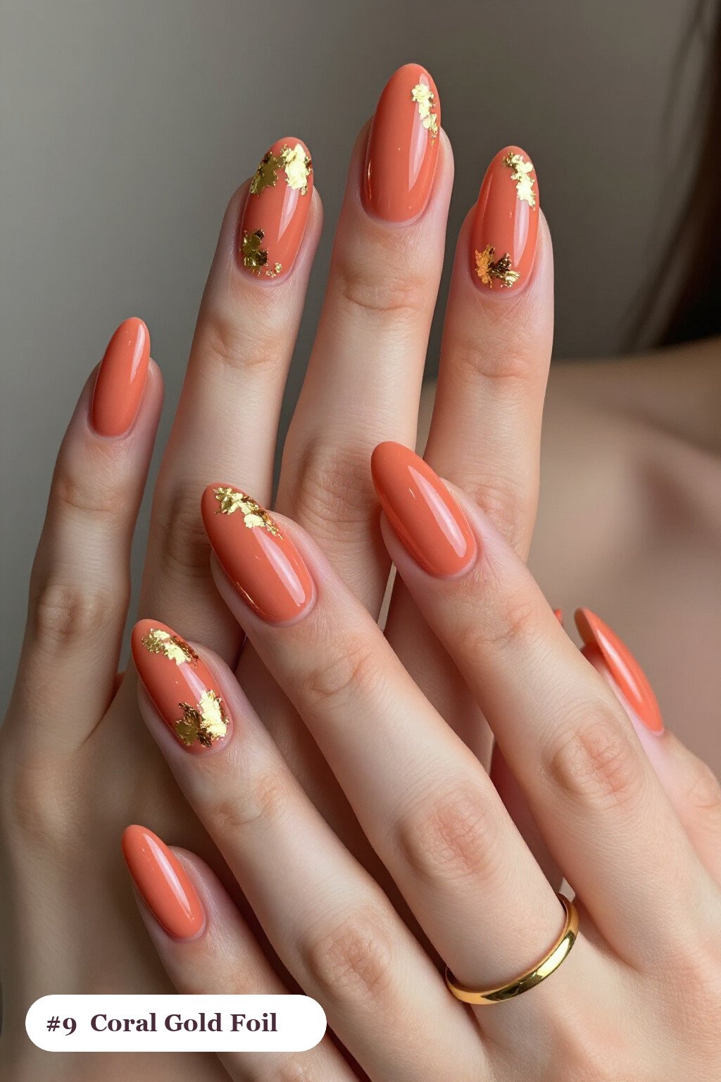 Long ballerina coral nails with dense gold foil flakes and gold leaf scattered across every nail, thanksgiving style - thanksgiving acrylic nail ideas