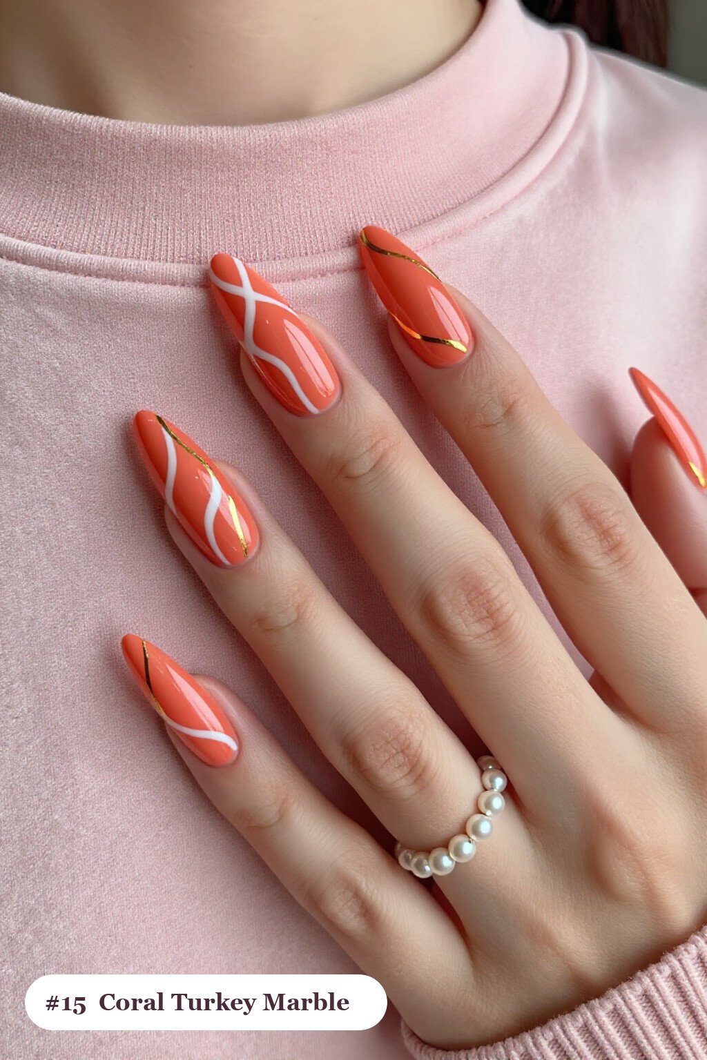 Coral Stiletto Nails Showcasing Bold White‑Gold Marble Veins - thanksgiving turkey nail designs
