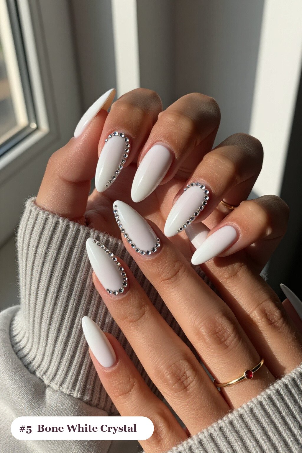 Coffin Bone White Nails Adorned with Rows of Sparkling Crystal Rhinestones - trendy halloween nails Coffin Bone White Nails Adorned with Rows of Sparkling Crystal Rhinestones - trendy halloween nails