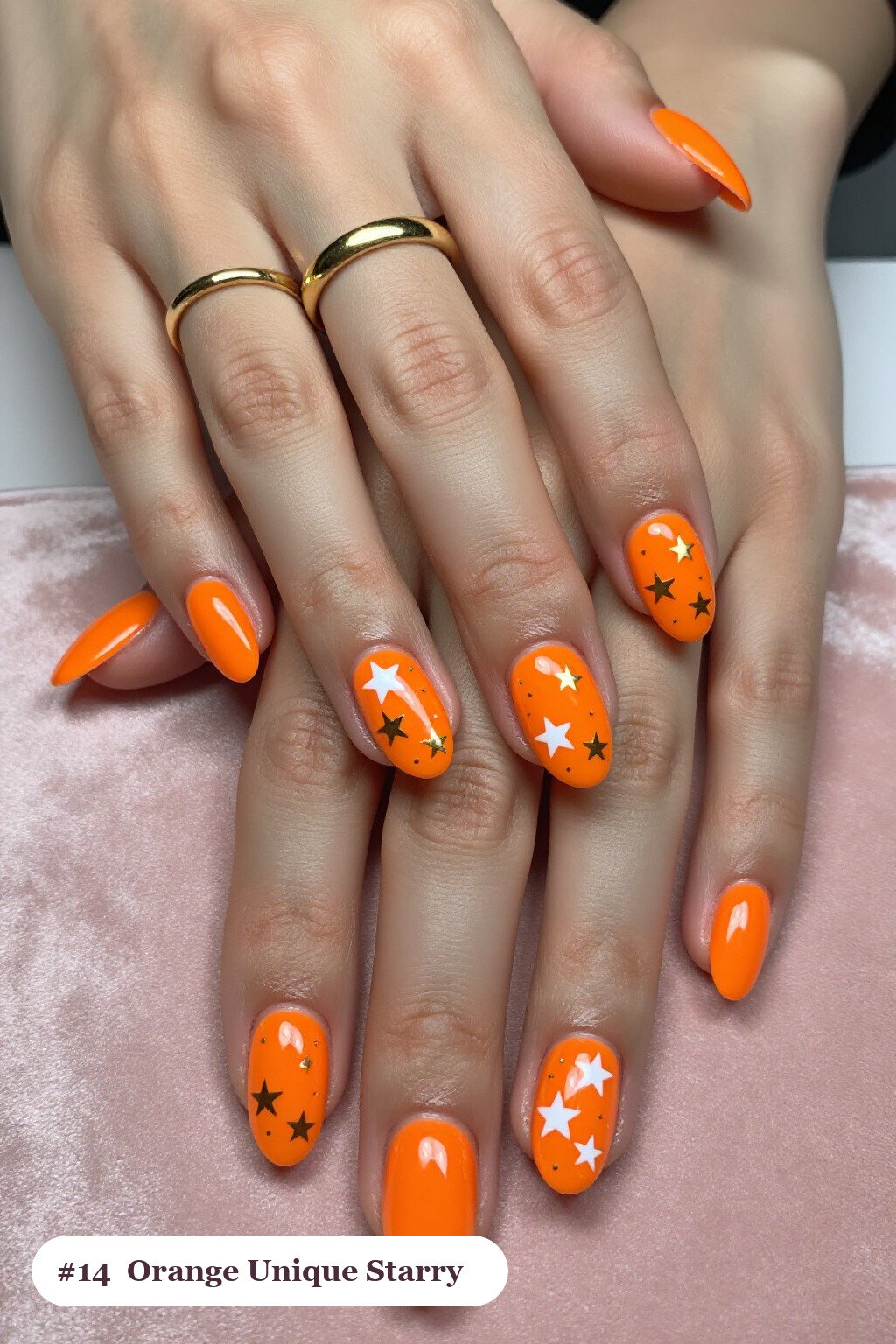 Medium Oval Orange Nails Sprinkled with White and Gold Stars and Sparkles - unique halloween nails Medium Oval Orange Nails Sprinkled with White and Gold Stars and Sparkles - unique halloween nails