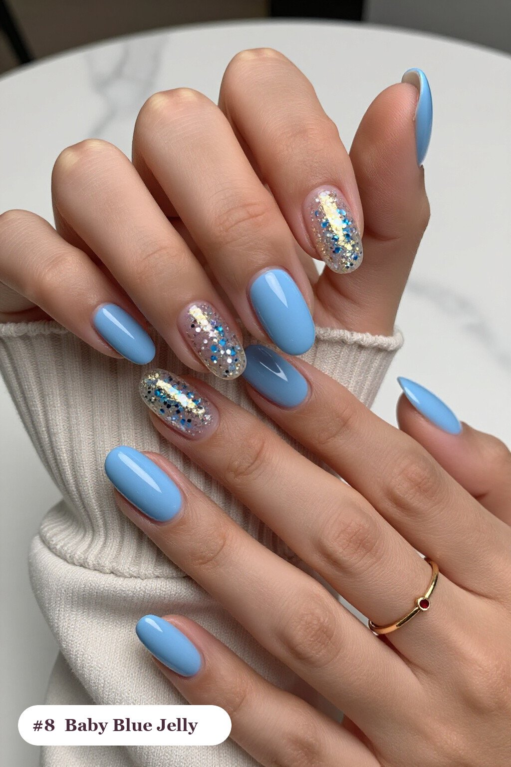Jelly‑Finish Oval Baby Blue Nails with Encapsulated Glitter - winter baby blue nails