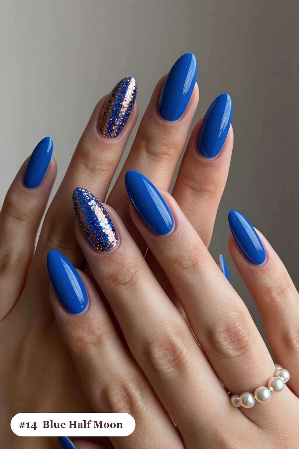 Half‑Moon Glitter Crescent on Long Ballerina Nails with Rose Gold - winter blue nails