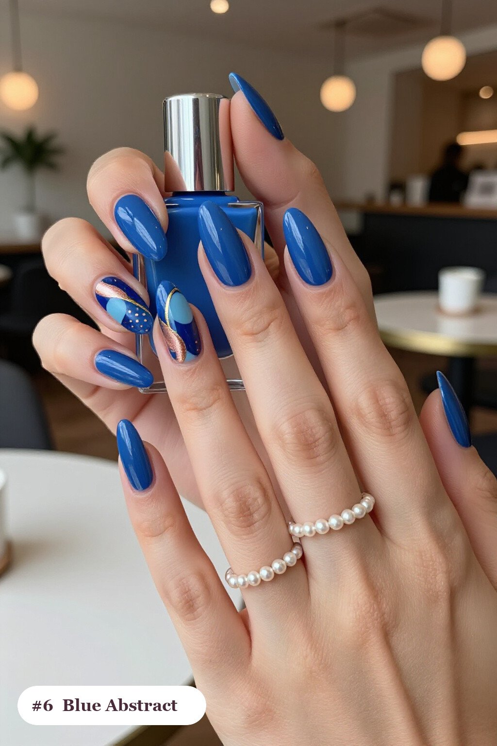 Winter Blue Nails with Abstract Colour‑Blob Art and Rose Gold Details - winter blue nails