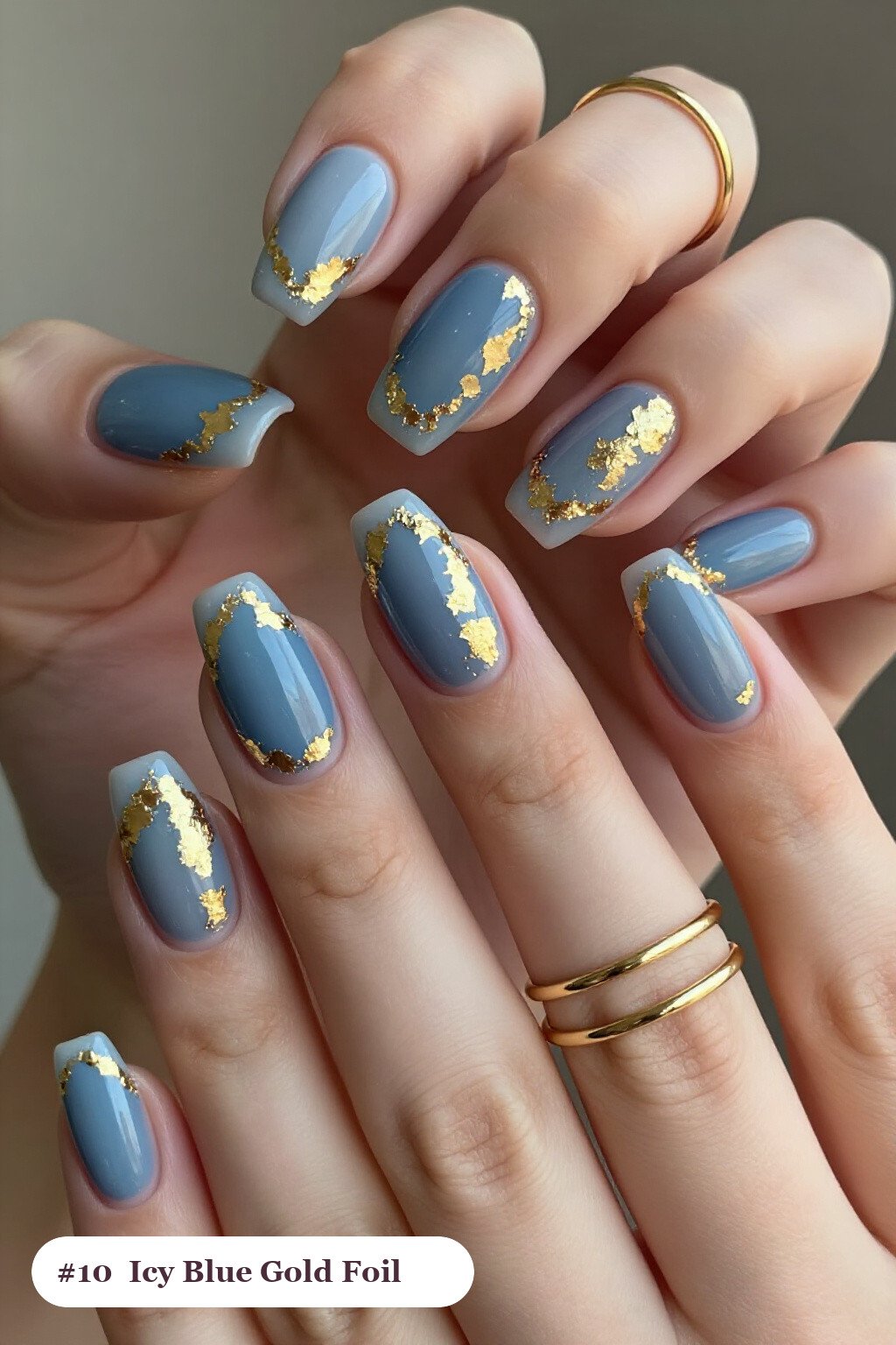 Icy Blue Medium Square Nails Covered in Dense Gold Foil Flakes - winter nails