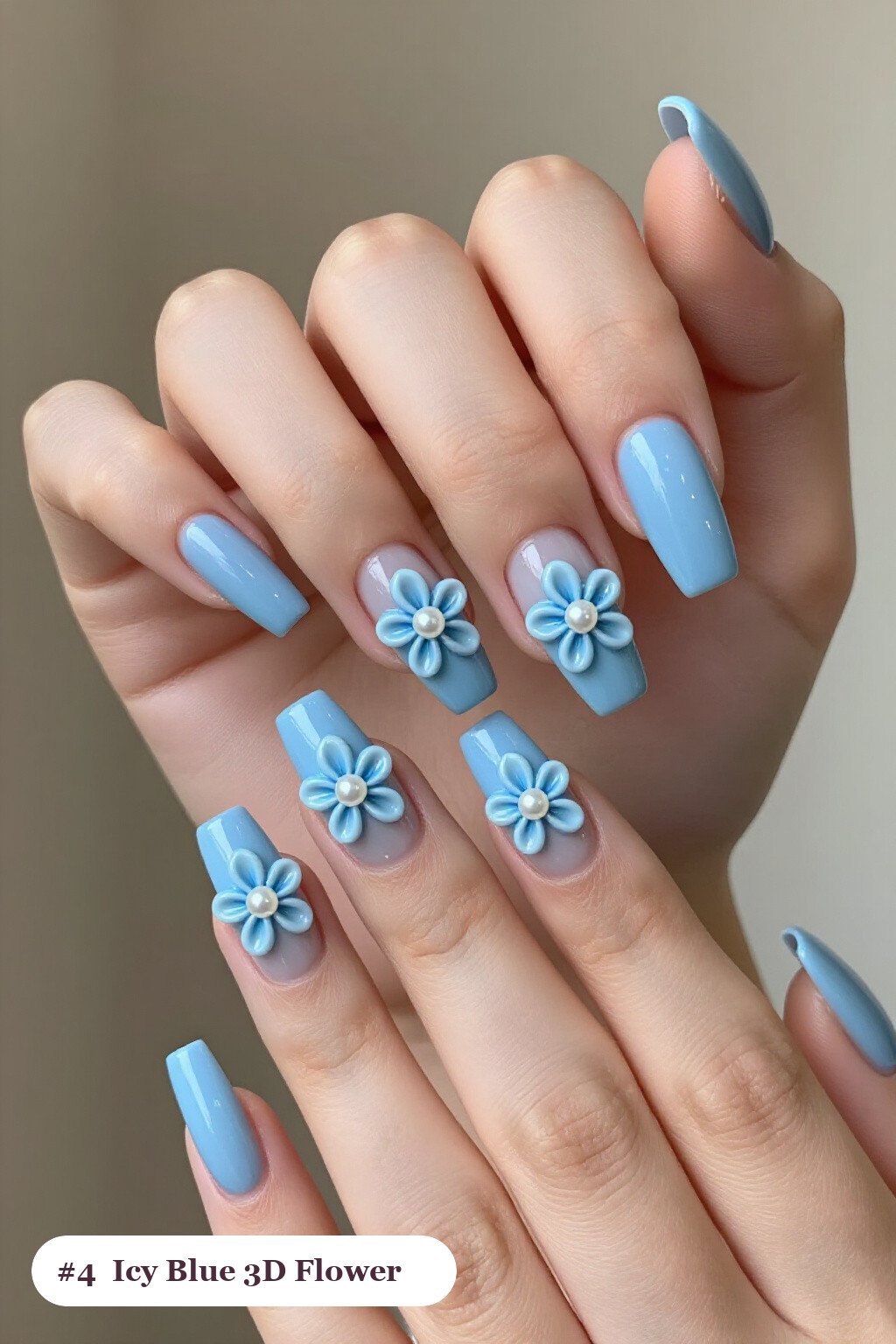 Icy Blue Long Square Nails with 3D Pearl‑Center Flowers - winter nails